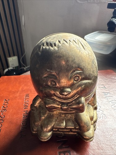 Vintage cast humpy dumpy coin - vintage,