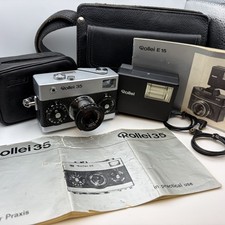 Rollei 35 Excellent Condition with leather bag, case, Rollei E15 Flash & manuals