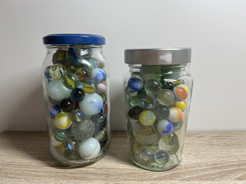 Marbles two jars - -, of
