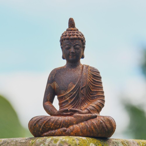 Rustic cast iron meditating - cast,