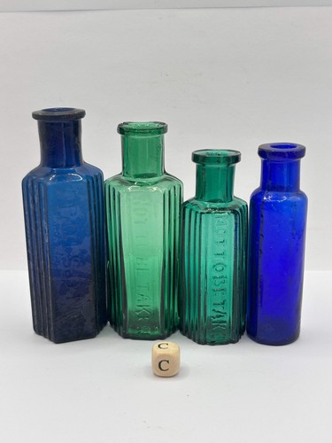 Old glass poison bottles - glass,