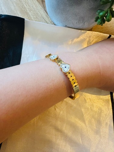 Bracelet with evil eye charms