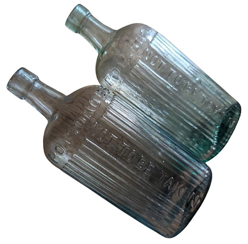 Vintage glass poison bottles - poison,