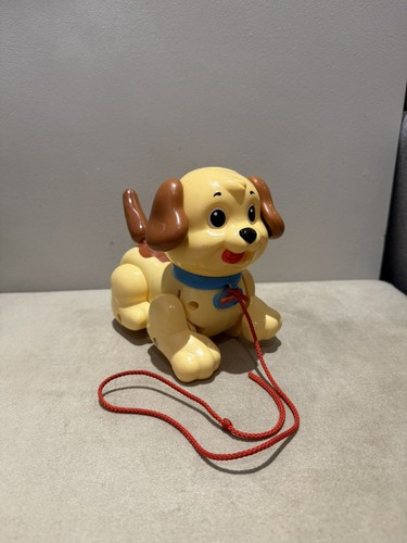 Fisher price pull along - along, dog