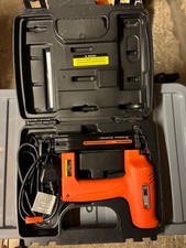 Tacwise Duo 35 Master Nailer and Tacker with many tacks and nails.