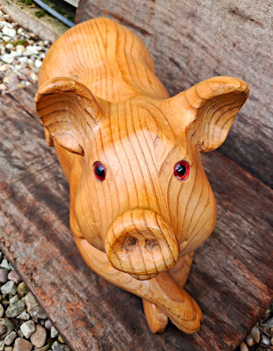 Hand carved wood pig - hand,