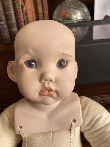Reproduction porcelain doll - reproduction,