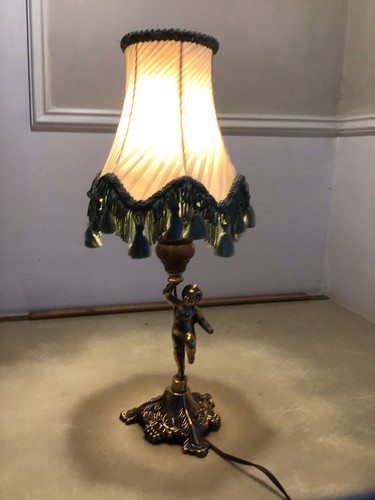 Vintage brass cherub lamp