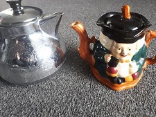 VINTAGE  TEAPOTS. SWAN CARLTON AND STAFFORDSHIRE USED BUT GOOD CONDITION.