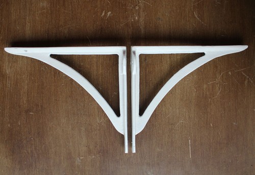 Pair white cast - pair, iron