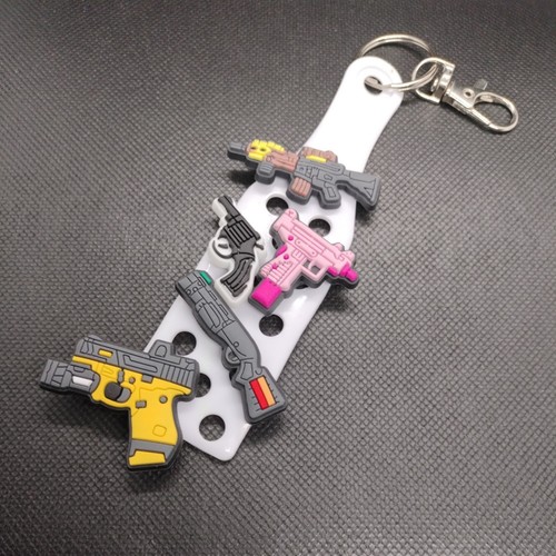 Gun shoe charms and - gun,