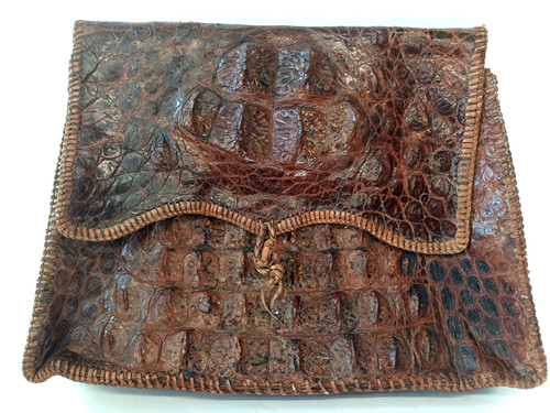 Brown crocodile skin clutch - skin,