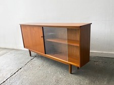 1960’s Mid-Centuryy teak bookcase by Avalon with sliding doors