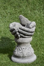 Concrete Bird In The Hands