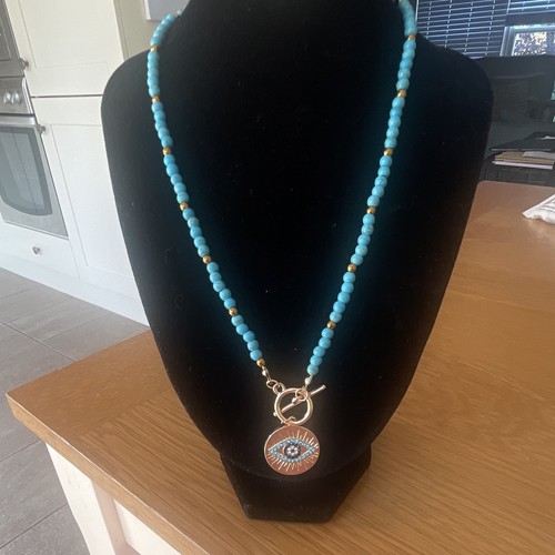Blue beaded necklace with - with, gold