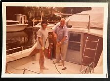 Happy Men Clean Boat Cabin