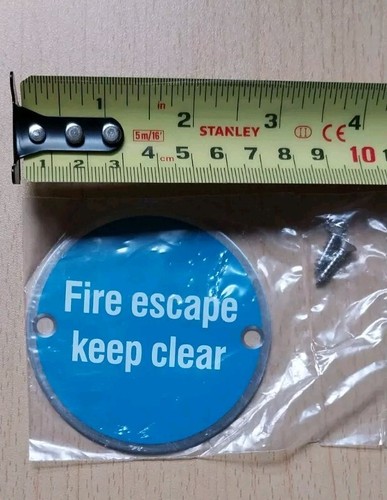 Fire escape keep clear sign - escape,