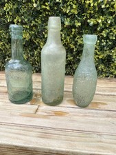 Three Vintage Glass Bottles