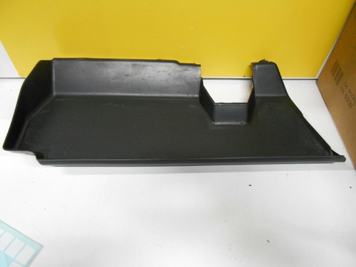 Driving side storage shelf for