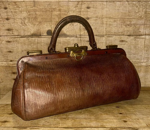 Antique brown english baghide - antique,