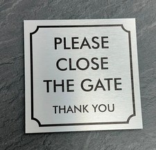 PLEASE CLOSE THE GATE SIGN /