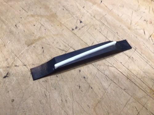 Righty ebony floating bridge - ebony,
