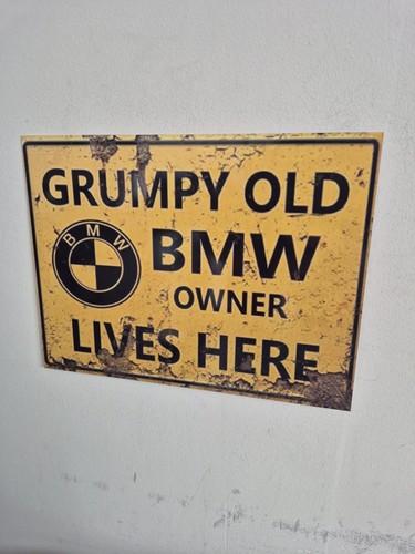 Grumpy old bmw metal tin - metal, wall