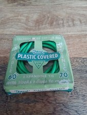 Vintage Taut Plastic Covered