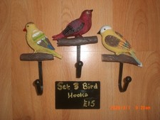 3 Metal Coat Hooks featuring