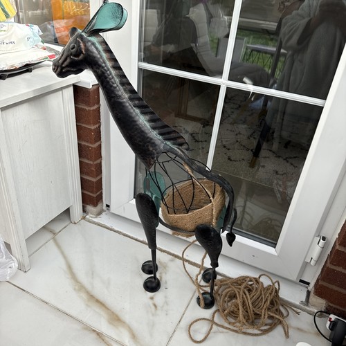 Indoor outdoor metal - metal, giraffe