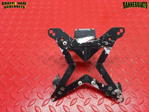 Damaged license plate support - damaged,