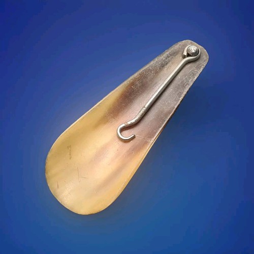 Antique horn and metal - and,