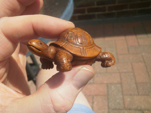 Hand carved wood netsuke - a,