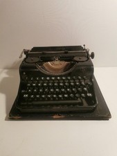 Olympia Simplex Portable