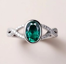 Oval Emerald Engagement Ring