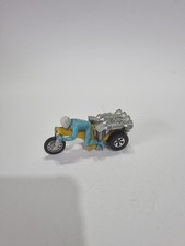 VINTAGE MATTEL HOT  WHEELS  RRRUMBLERS ROAMIN CANDLE  WITH LIGHT BLUE  RIDER
