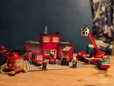 Lego fire service.  4 x vehicles, 1 x helicopter, 1 x fire station