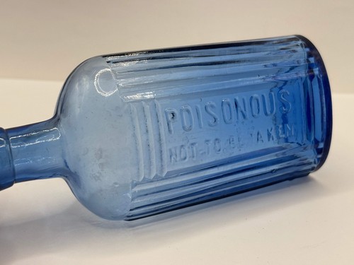 Old blue glass - poison, bottle