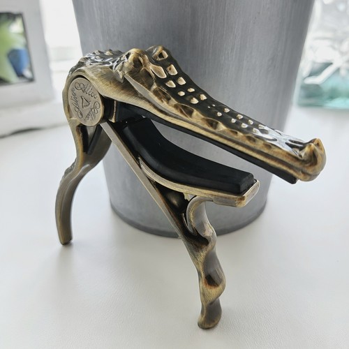 Unique crocodile guitar - guitar, capo