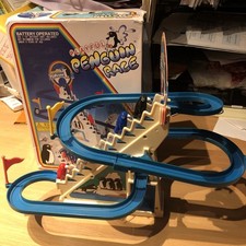 Playful Penguin Race vintage