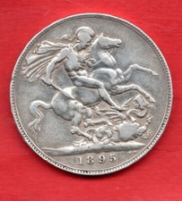 AN 1895 STERLING SILVER CROWN COIN. QUEEN VICTORIA VEILED HEAD. 'LIX' EDGE.