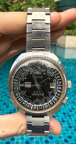 Orient world diver - world, time