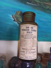 CARL A. SCHMIDT Antique  Iron and Potassium  Chlorate Amber Bottle
