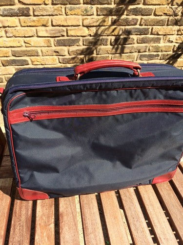 Longchamp suitcase with carry