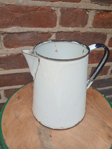 Vintage white enamel jug with - white,