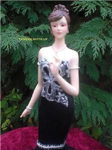 Black silver lady figurines - &,