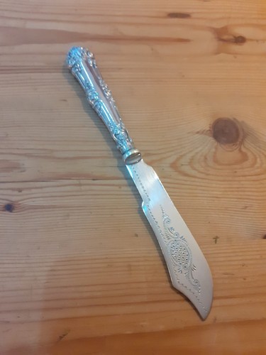 Antique silver butter knife