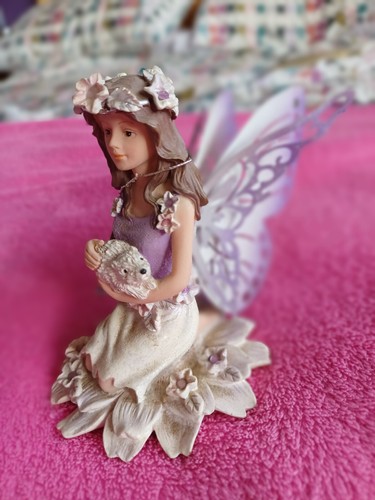 Regency fairy holding small - regency,