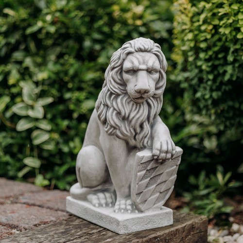 Lion with shield left stone