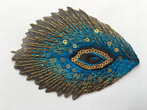 Sequined peacock tail applique